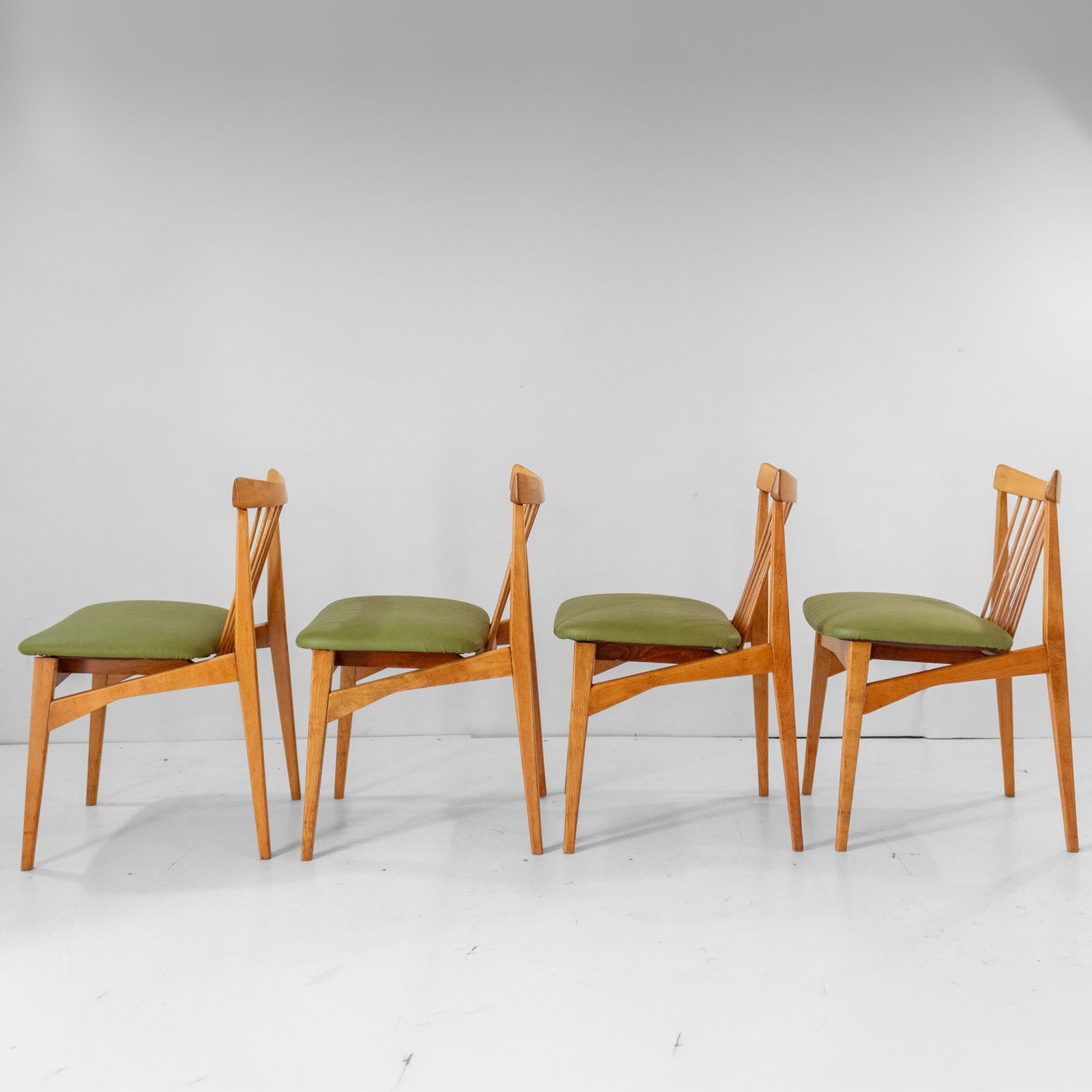 Four Mid Century Modern Italian Wood Dining Chairs In The Style Of Ico Parisi photo for sale