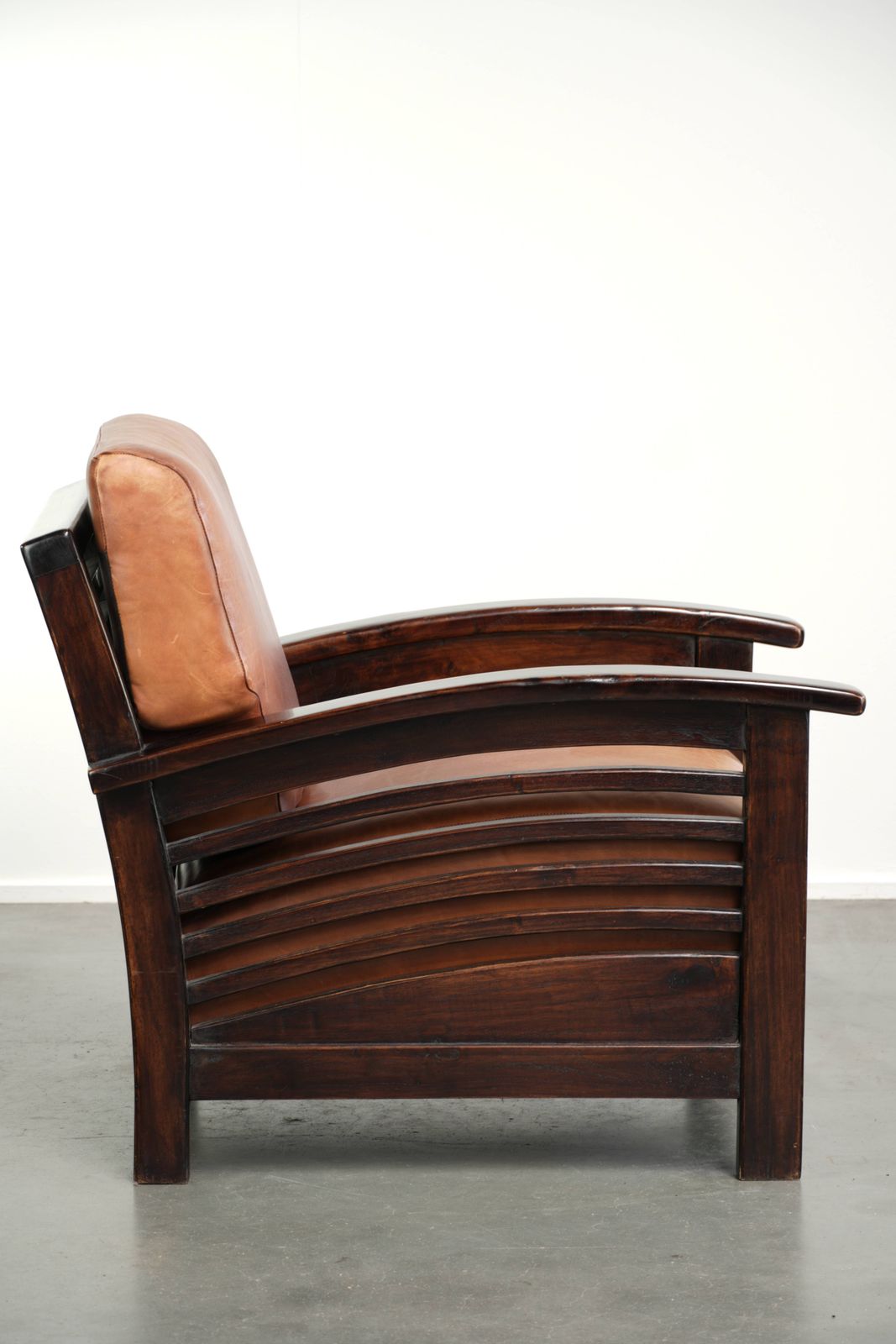 Elegant Cowhide Leather Armchair With Beautiful Details In A Timeless Art Deco Design photo for sale