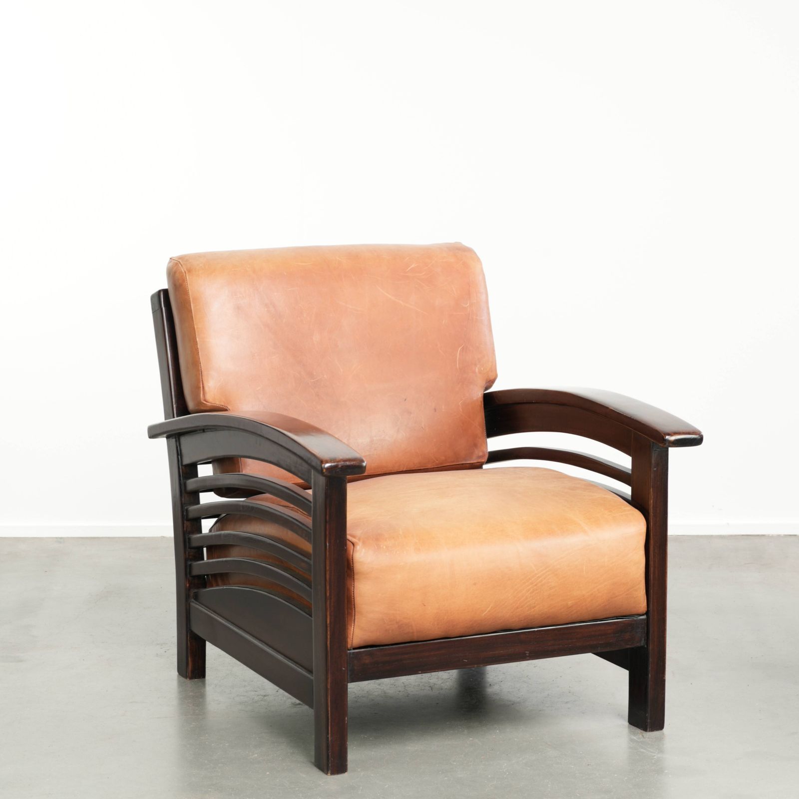 Comfortable And Beautiful Cognac Colored Cowhide Armchair In Luxurious Art Deco Design