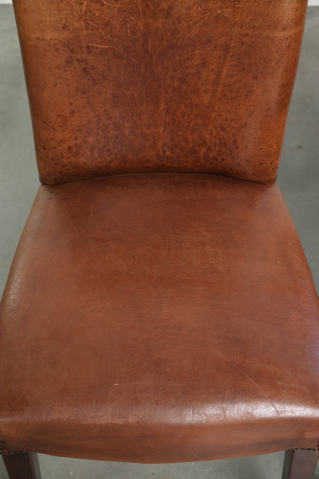 Set van 6 schapenleren eetkamerstoelen in een mooie cognackleur met fraaie patina photo buy