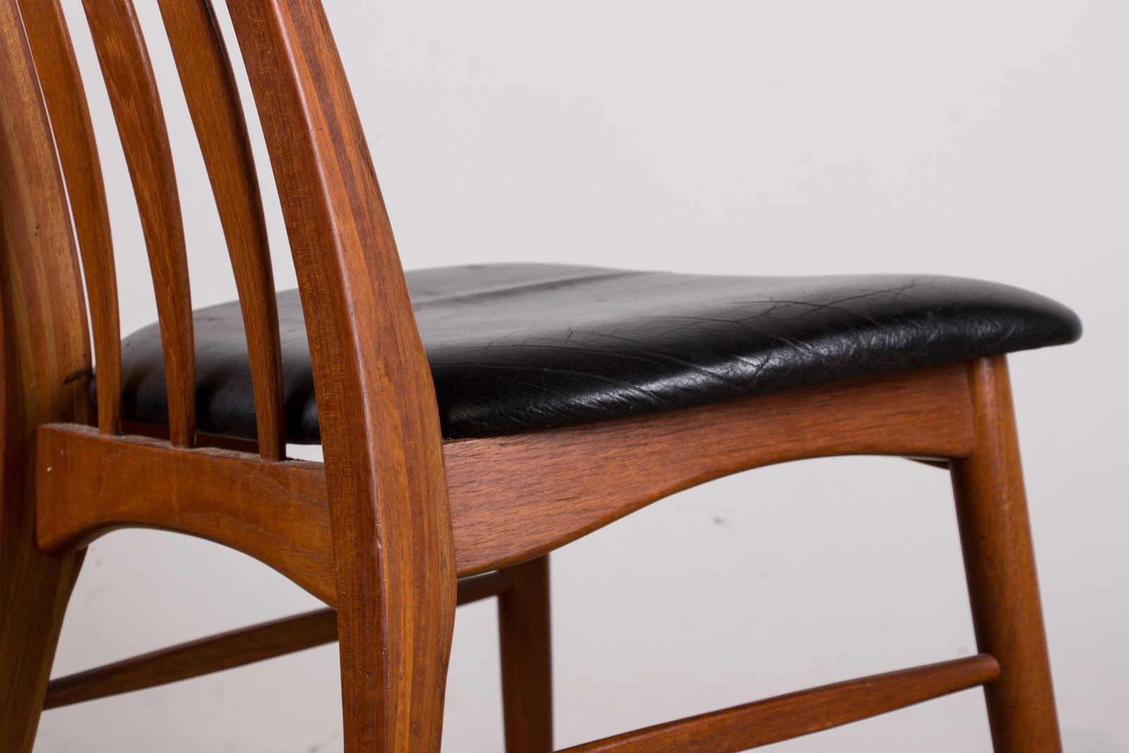 photo for sale Set Of 6 Danish Teak And Black Leather Chairs, "Eva" Model By Designer Niels Koefoed, 1960.