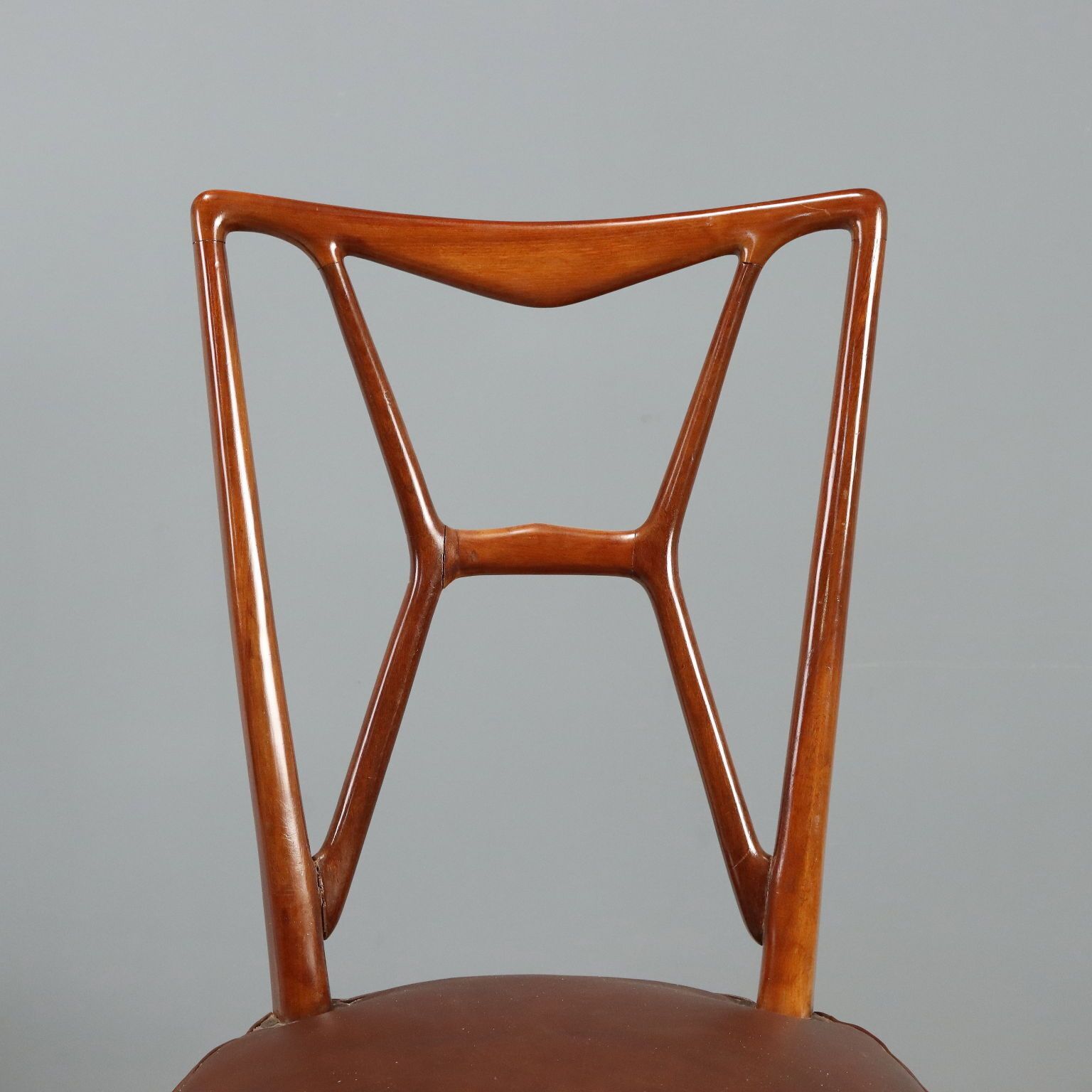 Vintage stoelen hout kunstleer design Italië jaren 1950 photo Meubels