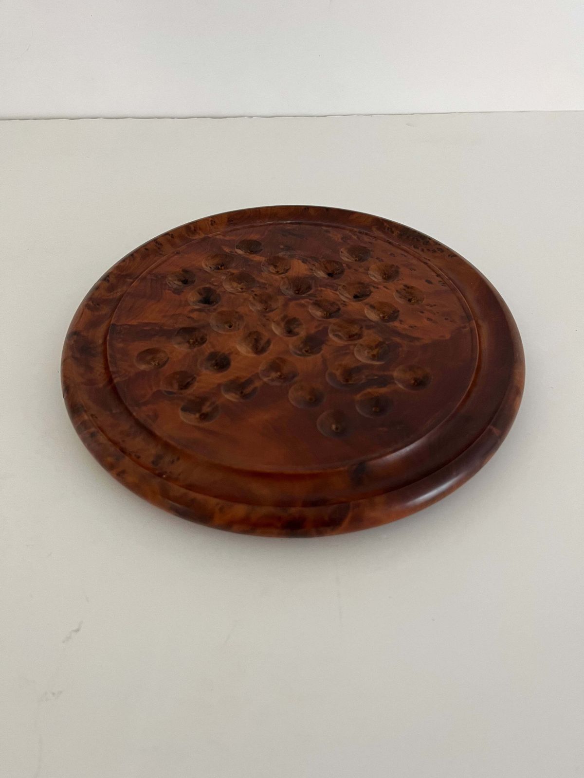 photo furniture Marble Solitaire Board Game With 33 Handmade 19th Century Clay Or Stone Marbles.