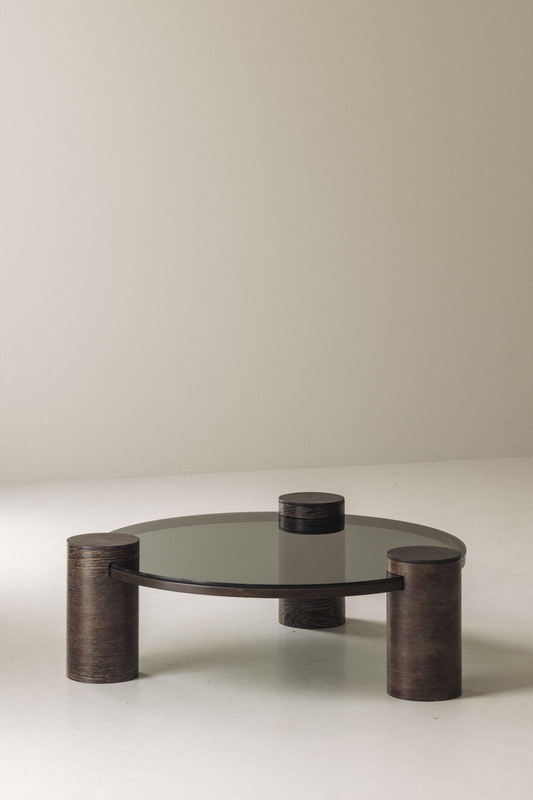 Sculptural Brutalist Wengé And Smoked Glass Round Coffee Table, 1970s photo vinterior