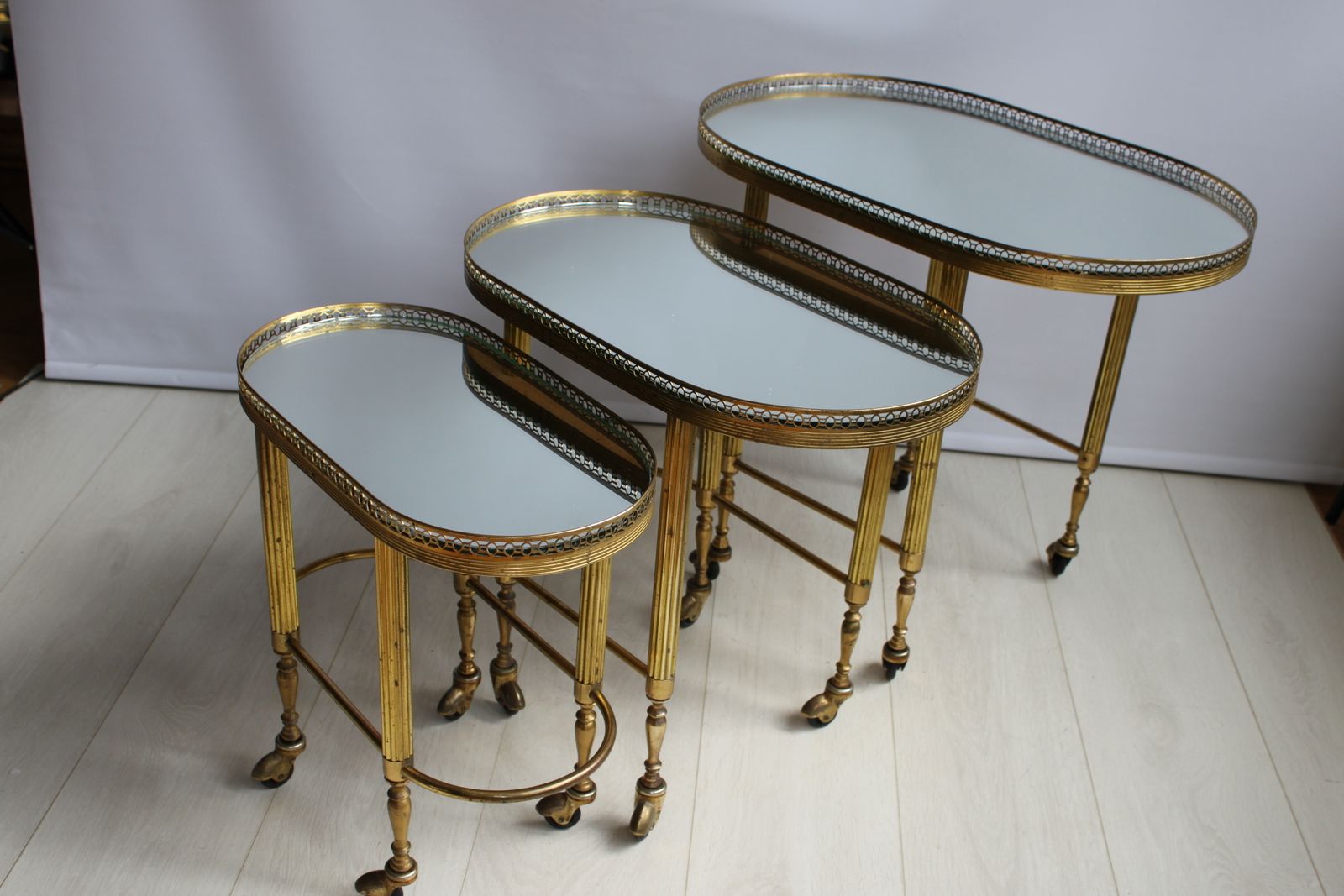 Nest Of Brass French Trolleys photo Furniture