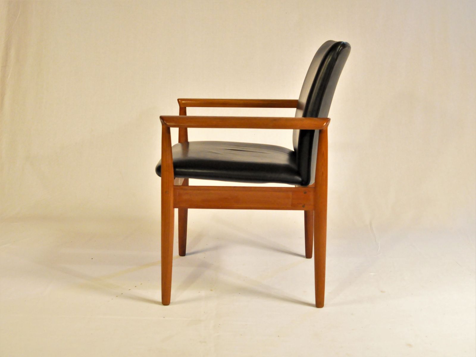 1960s Finn Juhl Model 209 Diplomat Chair In Teak And Black Leather By Cado photo for sale