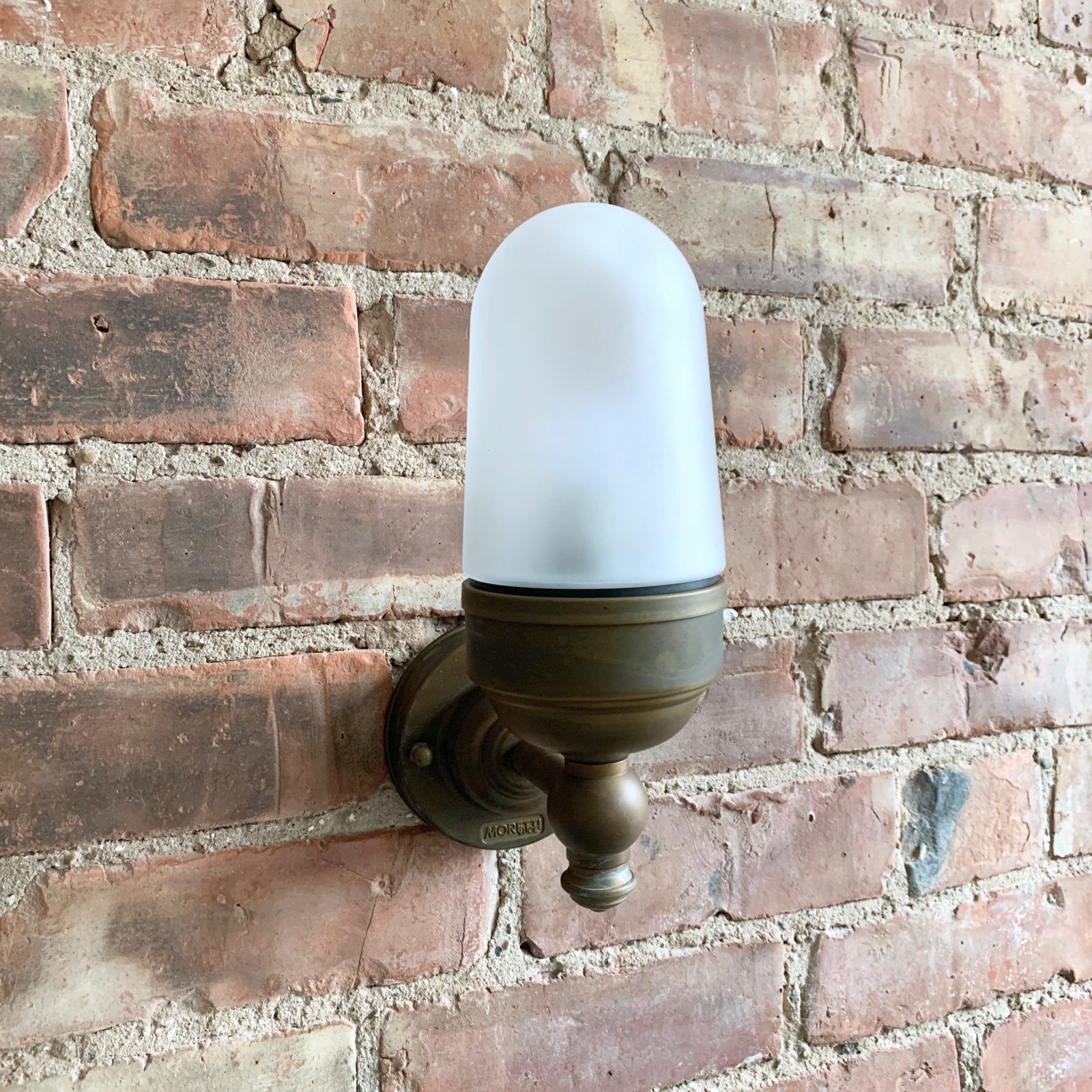 photo furniture Contemporary Aged Brass Torch Wall Light With Frosted Shade