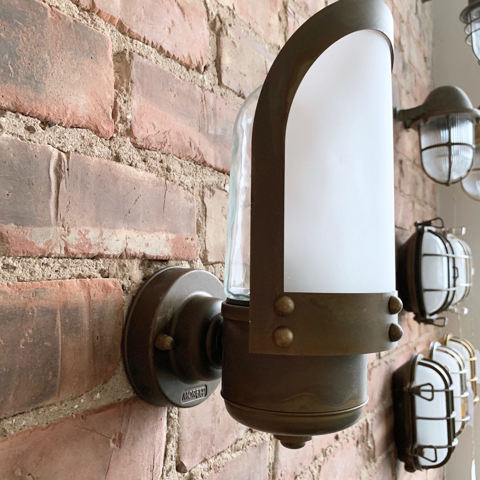 photo furniture Contemporary Aged Brass Wall Light With Frosted Shade