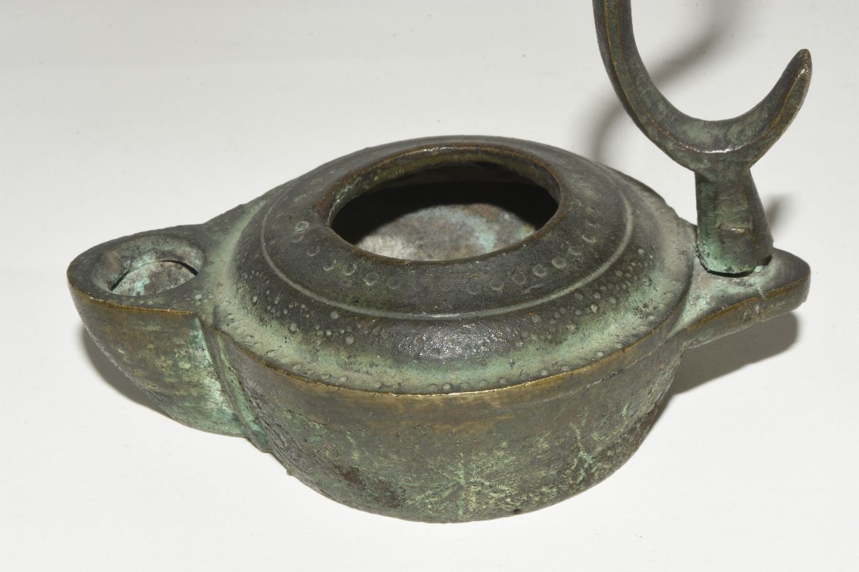 Old Oil Lamp In Antique Bronze photo furniture
