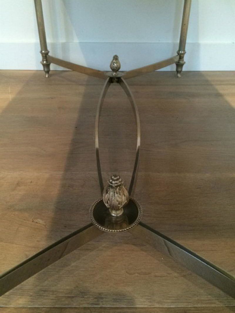 In The Style Of Maison Jansen. Silvered Coffee Table With Black Lacquered Glass Top. Circa 1940 photo for sale