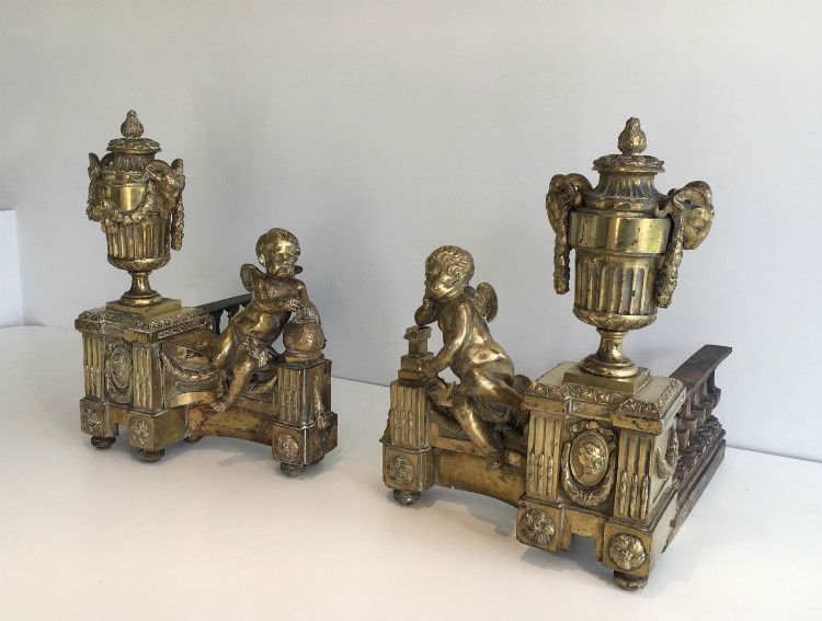 Beautiful Chiseled Bronze Andirons Representing A Cherub With The Earth And Another Cherub Working With An Anvil. Circa 1850