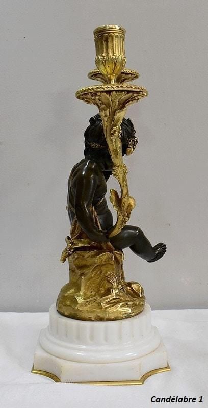 photo for sale Pair Of Bronze Candelabras, "Un Amour Et Un Faune", After Clodion And Delarue , End Of The 19th Century