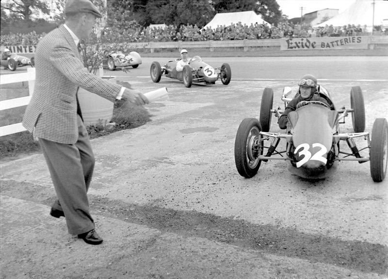 'Moss At Goodwood' 1954 Archival Pigment Print Framed In White photo furniture