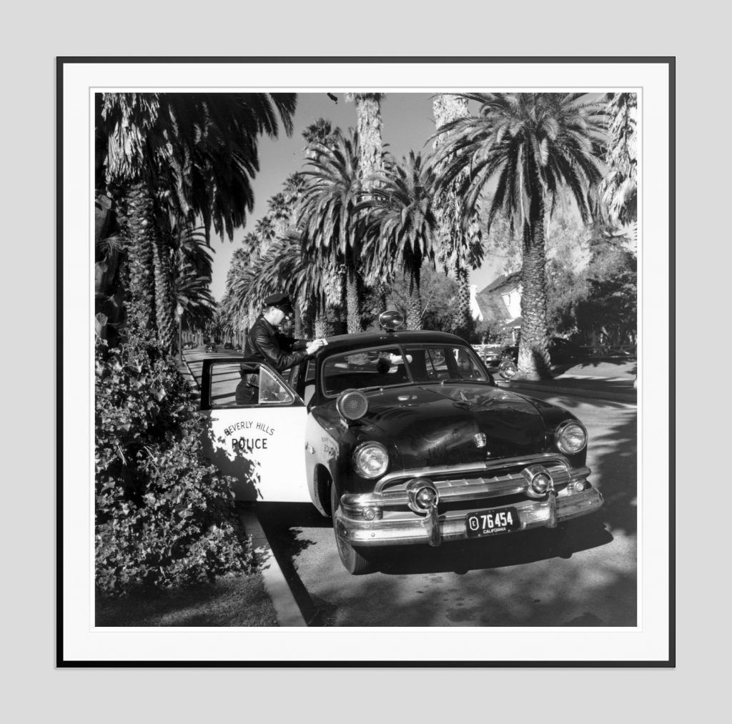Slim Aarons 'Beverly Hills Cop' Black Frame Silver Gelatine Resin Print