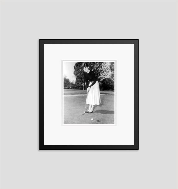 'Audrey Hepburn Playing A Spot Of Golf' 1953 Archival Pigment Print Framed In Black