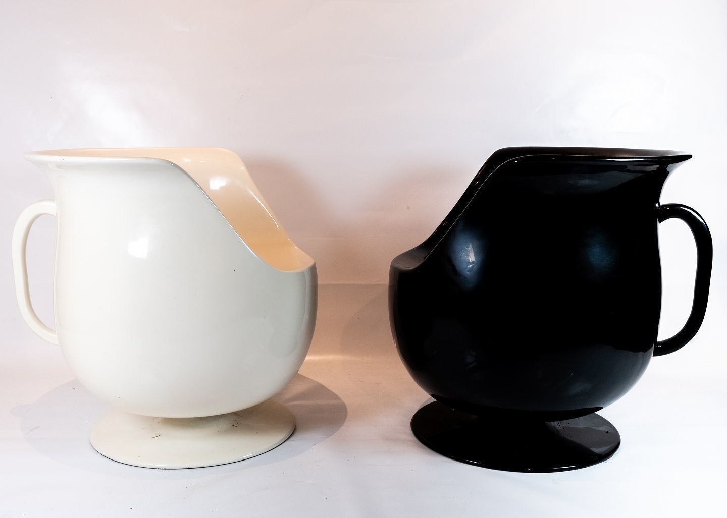 Chairs In The Form Of Teacups In White And Black Of Hard Plastic From The 1980s.