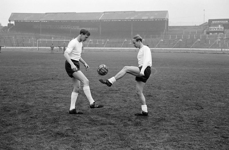 'Football Brothers' 1965 Archival Pigment Print Framed In Black photo furniture
