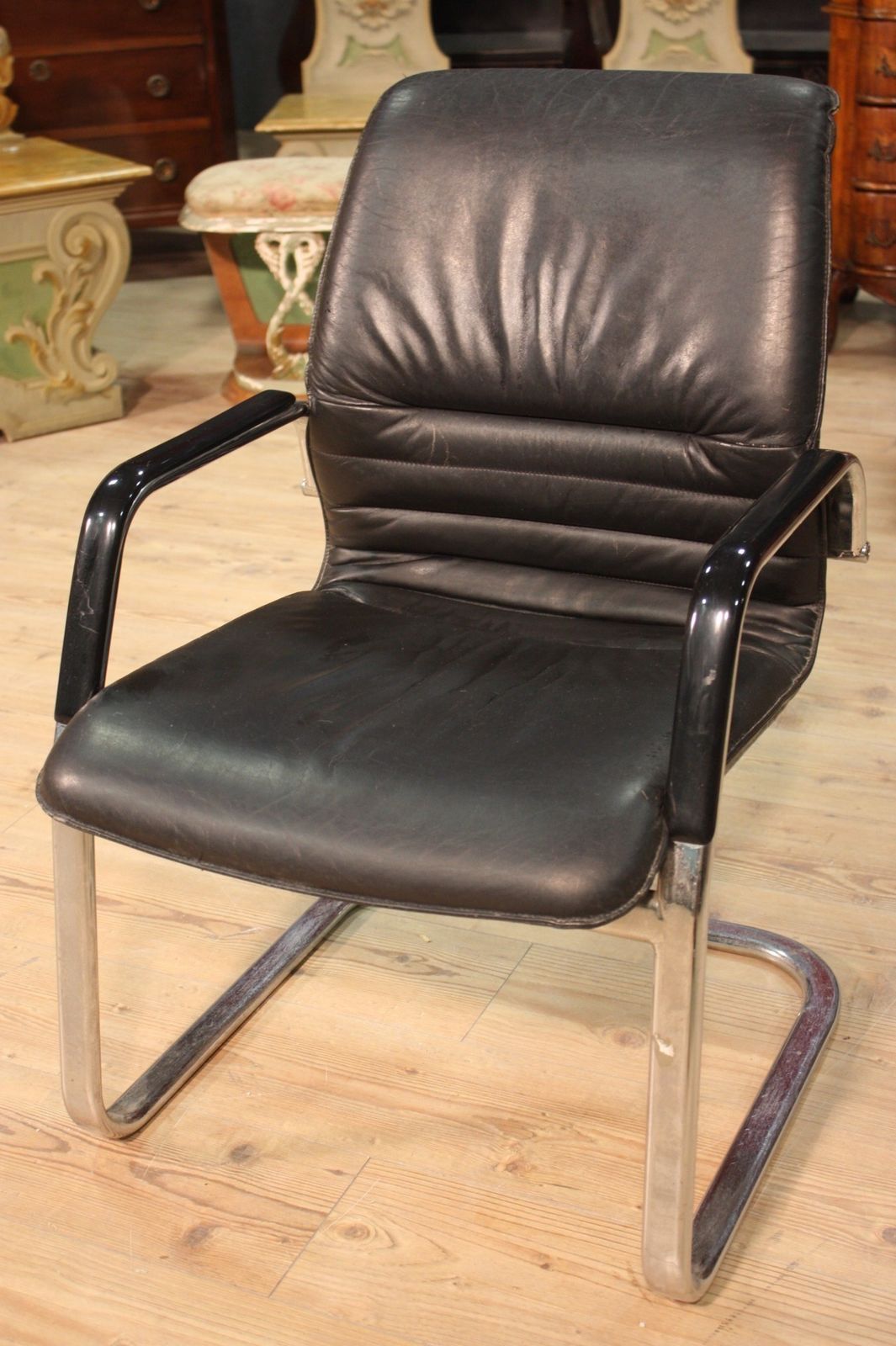 Designer Armchair In Plastic And Fake Leather photo furniture