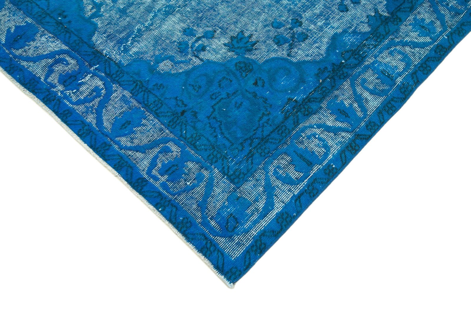 Handgemaakt handgeknoopt blauw overdyed vloerkleed photo Textiel