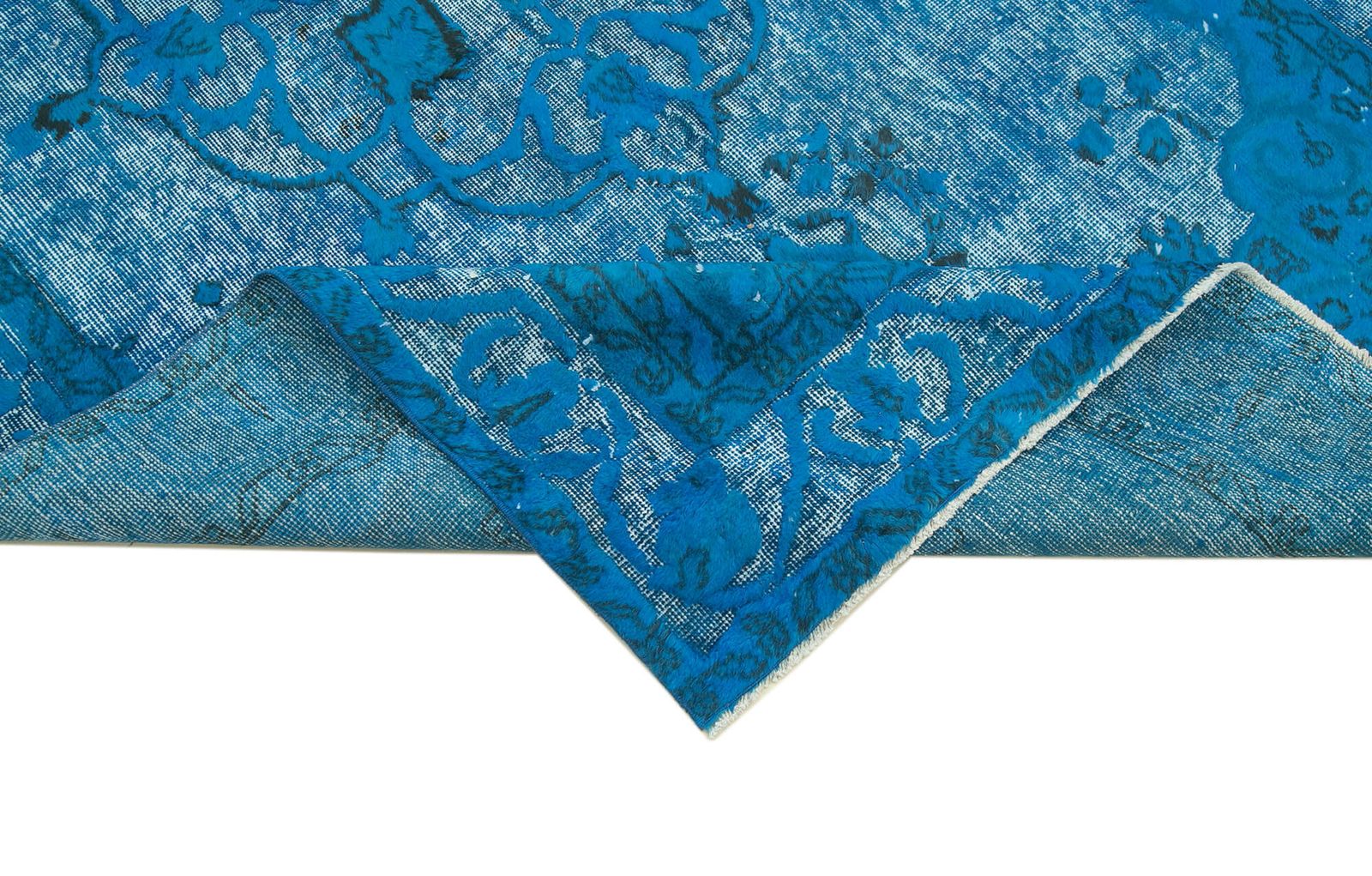 Handgemaakt handgeknoopt blauw overdyed vloerkleed photo vinterior