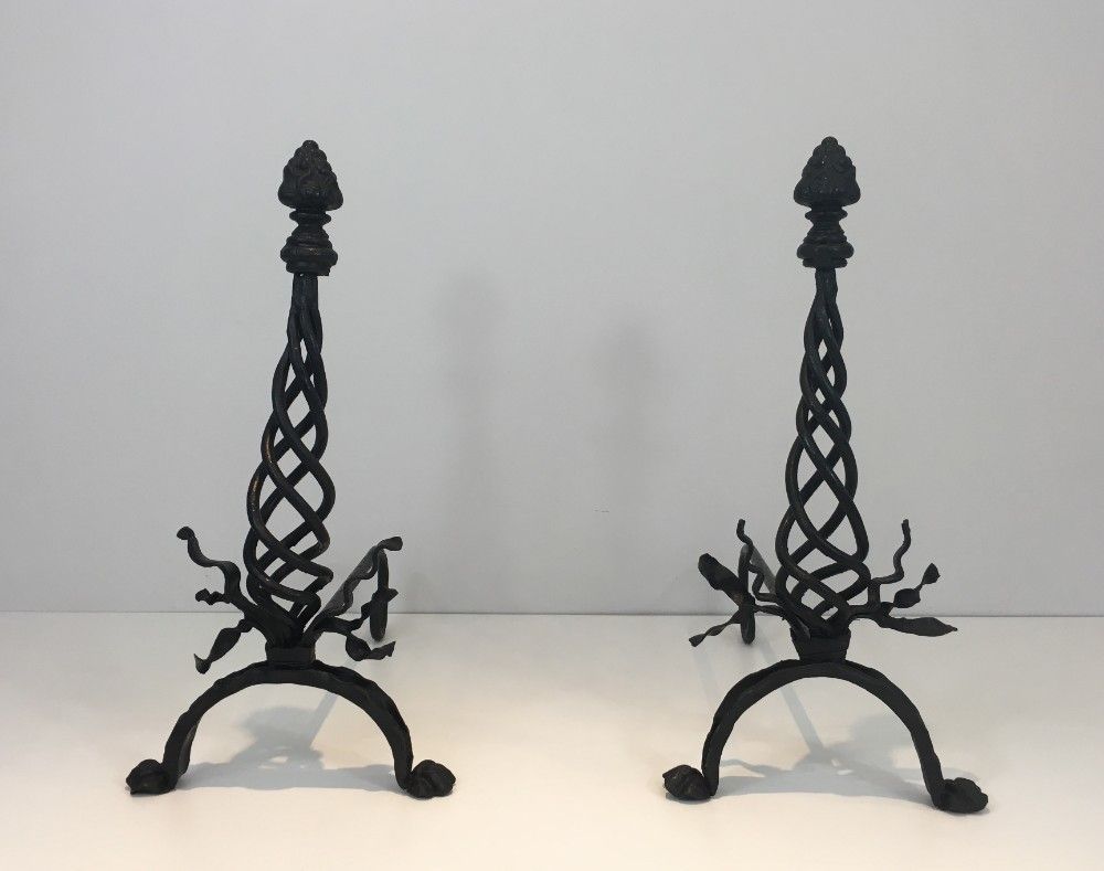 Pair Of Twisted Wrought Iron Andirons With Finials. French. Circa 1940 photo for sale