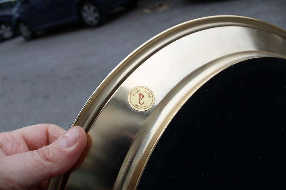 photo furniture Round Tray In Golden Brass With Black Background And Real Leaves Made In Italy