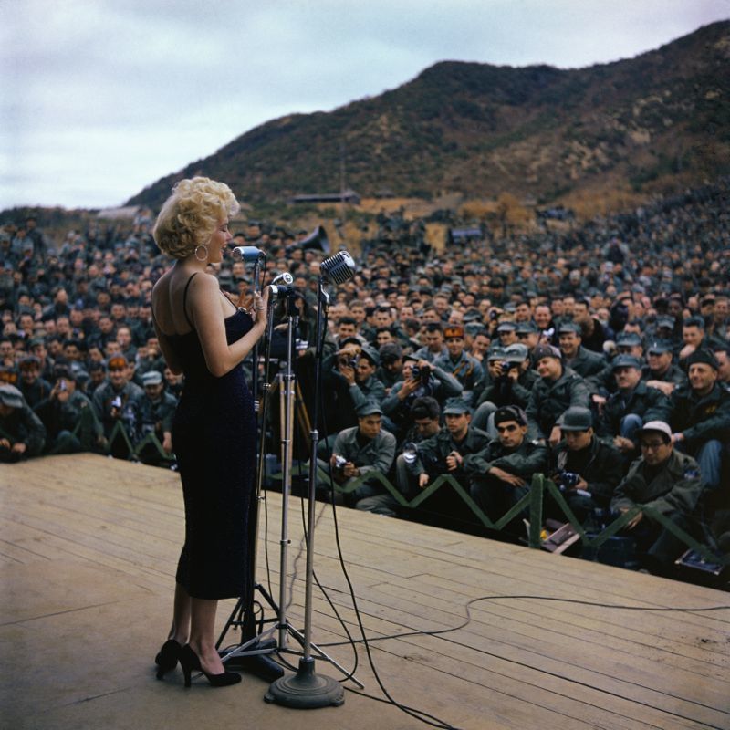 'Marilyn Monroe Entertaining Troops' 1954 C Type Print Framed In Black photo furniture