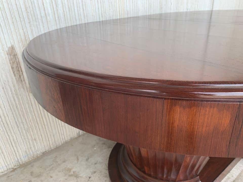 photo vinterior Table ovale Art déco française à deux pieds centraux en orme maillé, avec six chaises