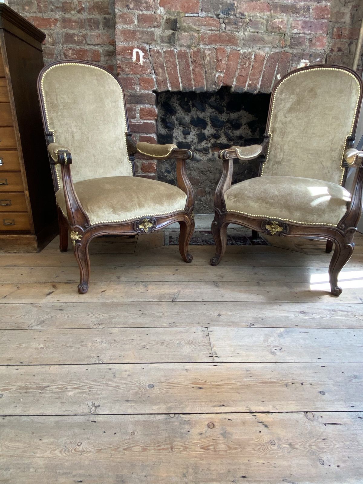 photo furniture Exceptional Pair Of French Empire Walnut Chairs Arm Chairs With Gilt Ormolu Mounts