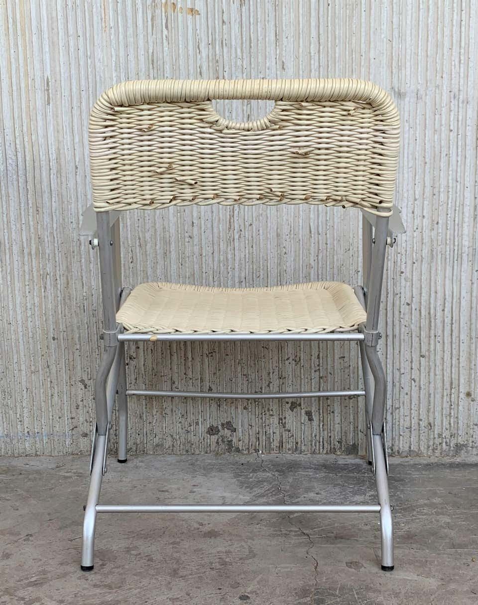 photo furniture Paire de fauteuils pliants mid-century modern en rotin laqué et aluminium