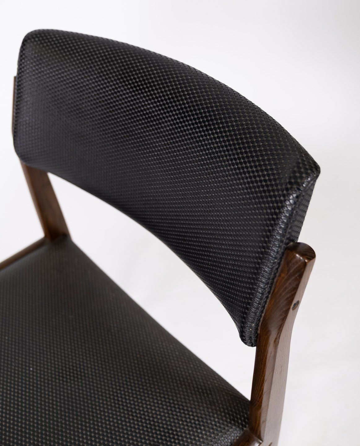 Set Of Four Dining Chairs Of Black Upholstery And Dark Wood Of Danish Design From The 1960s. photo Furniture