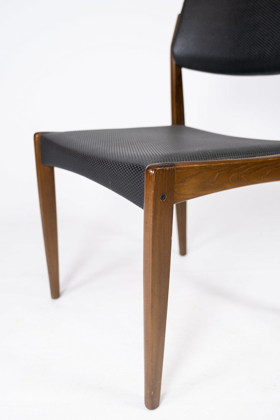 Set Of Four Dining Chairs Of Black Upholstery And Dark Wood Of Danish Design From The 1960s. photo 960.0