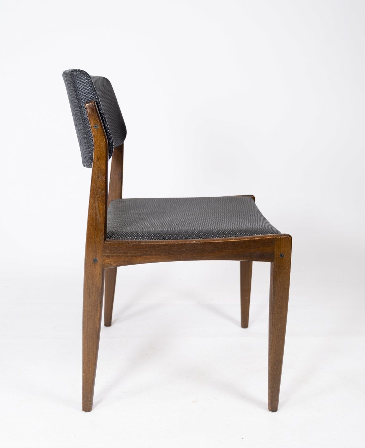 photo furniture Set Of Four Dining Chairs Of Black Upholstery And Dark Wood Of Danish Design From The 1960s.