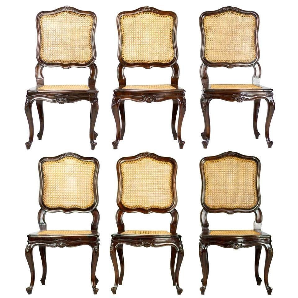 Set Of Six French 19th Century Louis XV Style Caned Dining Chairs In Walnut