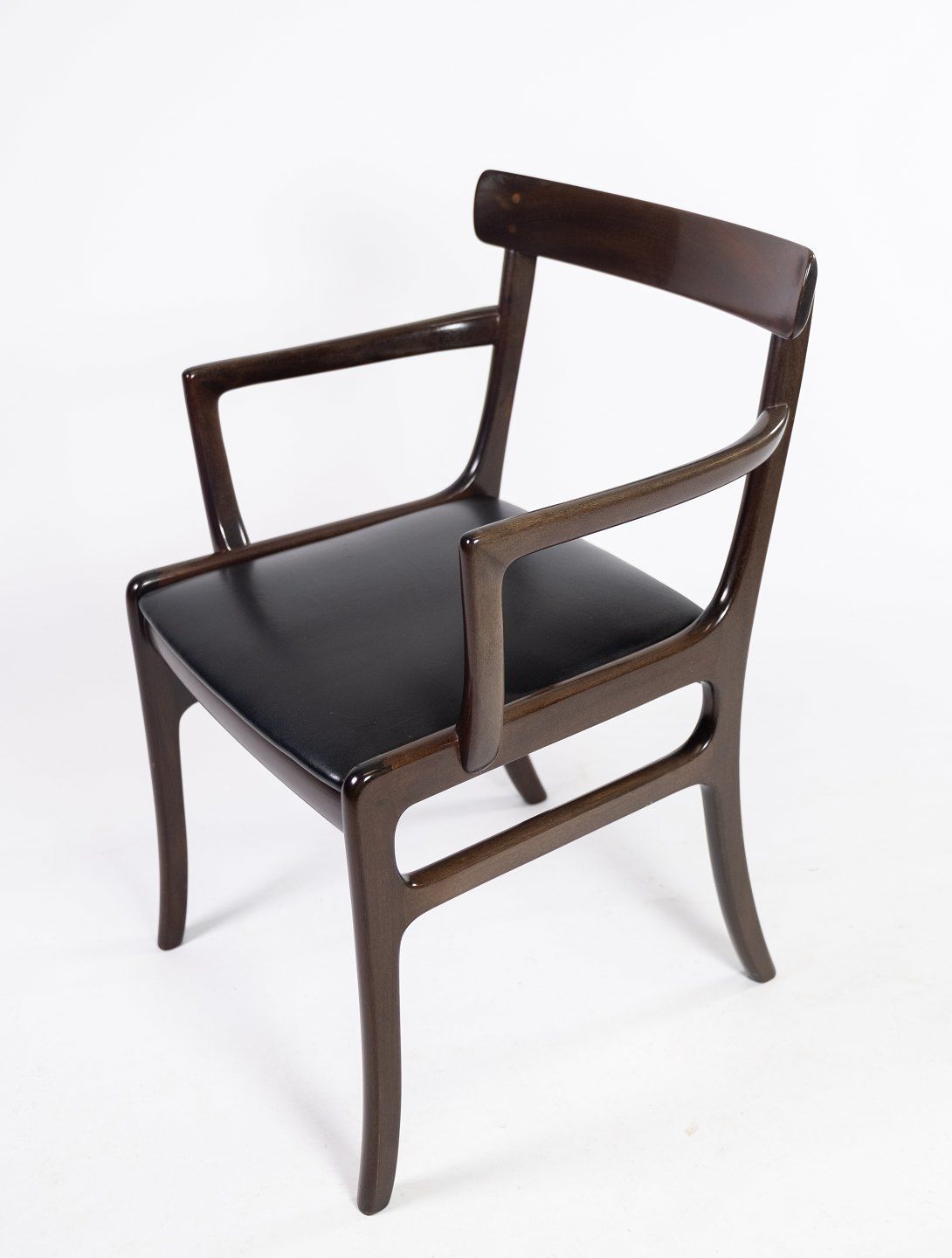 A Pair Of Rungstedlund Armchairs In Mahogany And Uppolstered In Black Leather, By Ole Wanscher And P. Jeppesen. photo furniture