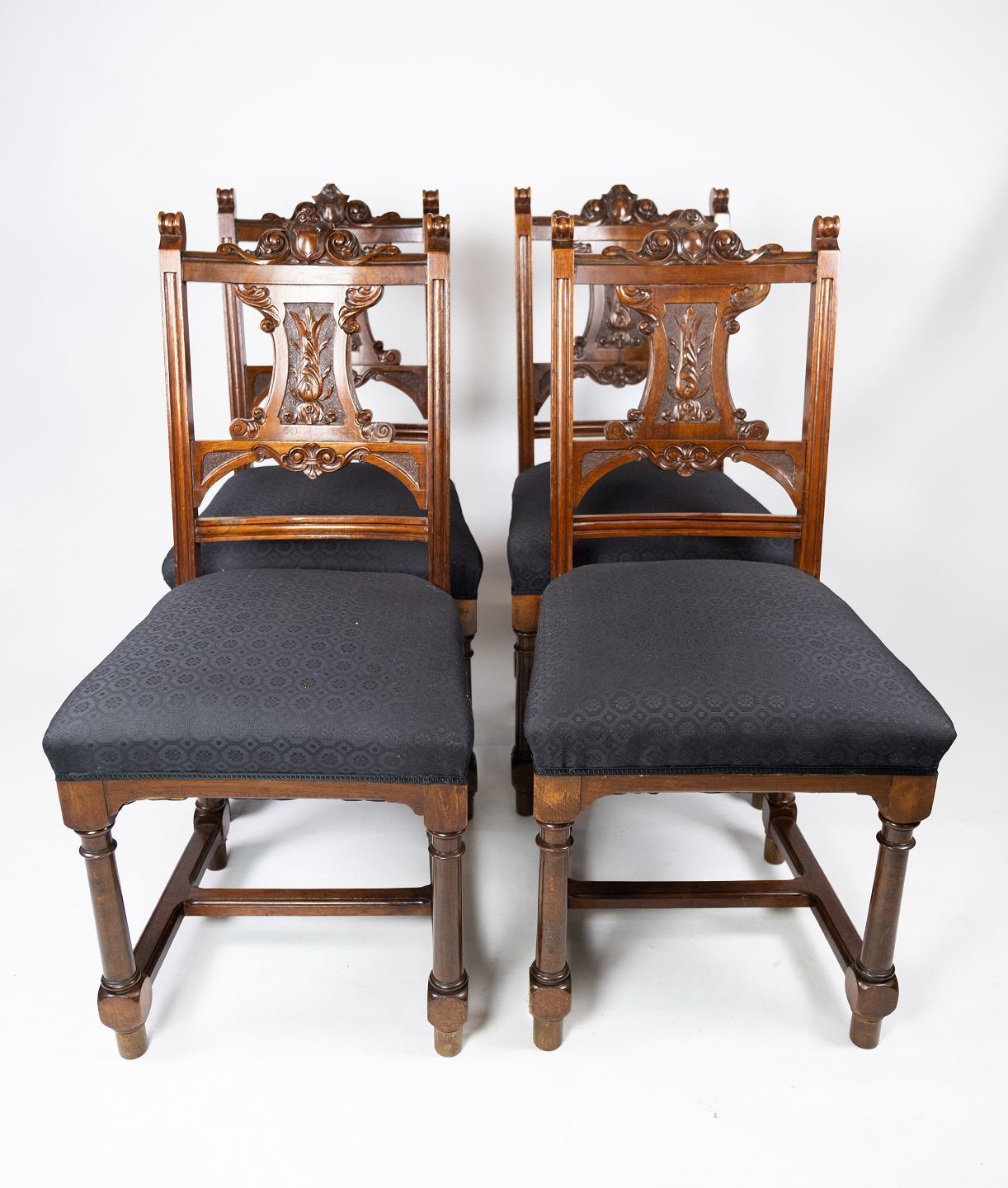 Set Of Four Dining Room Chairs In Walnut And Newly Upholstered With Black Fabric, From The 1890s.