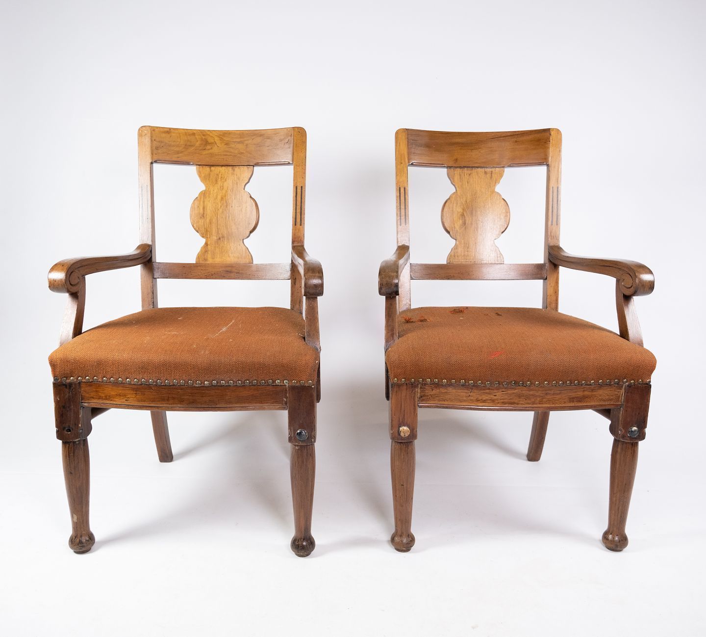 A Pair Of Antique Armchairs Of Dark Wood And Wool Fabric From The 1930s.