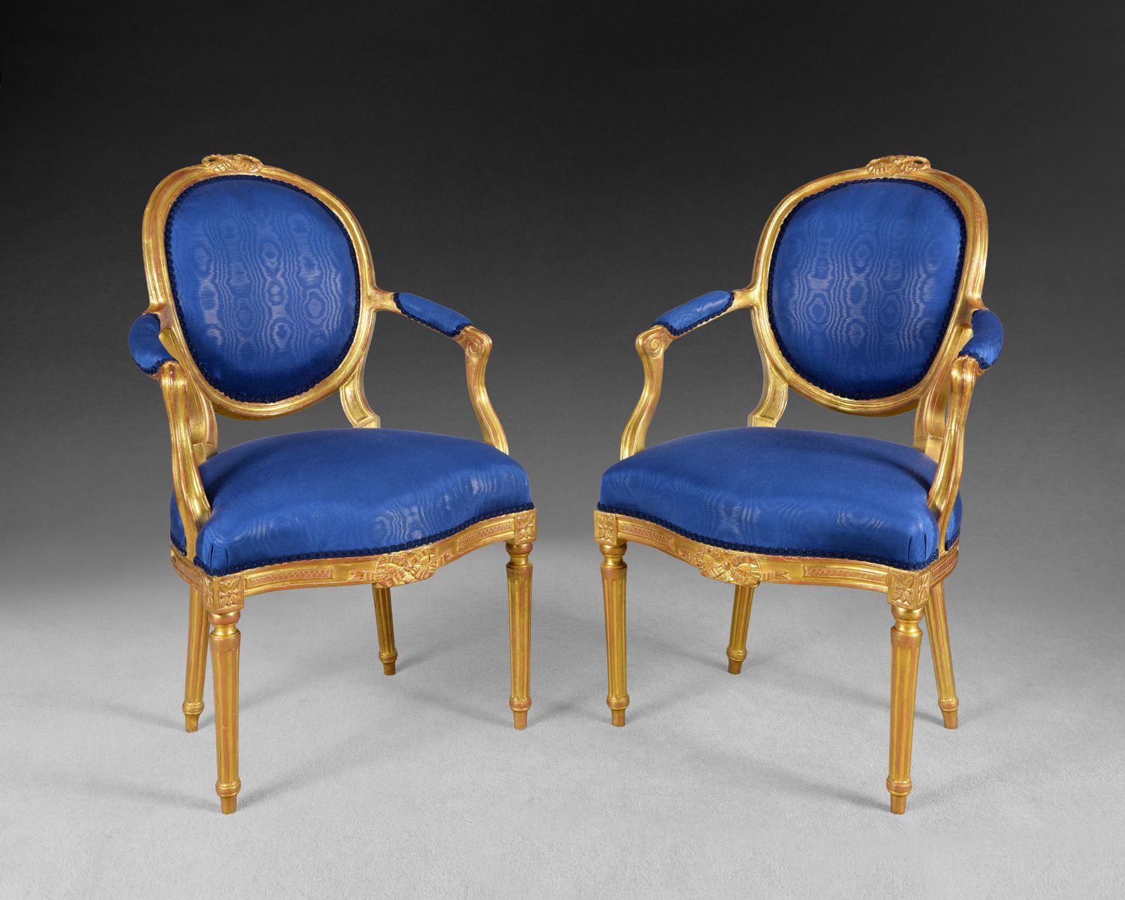 Pair Of George III Carved Giltwood Salon Armchairs