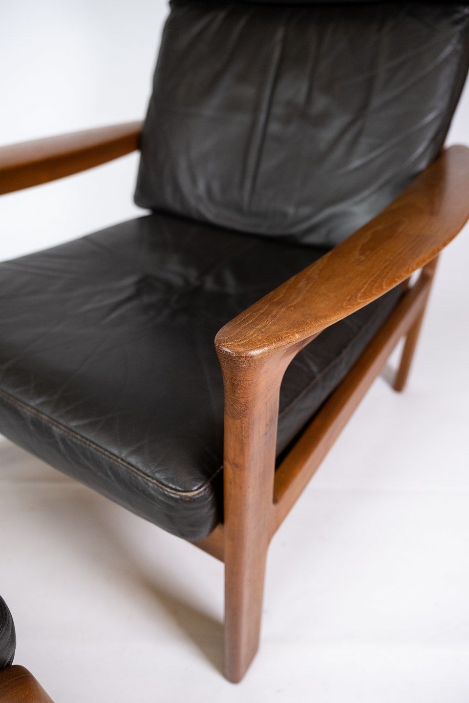 Armchair And Stool In Teak Upholstered With Black Leather Designed By Arne Vodder And Manufactured By Komfort In The 1960s. photo Furniture