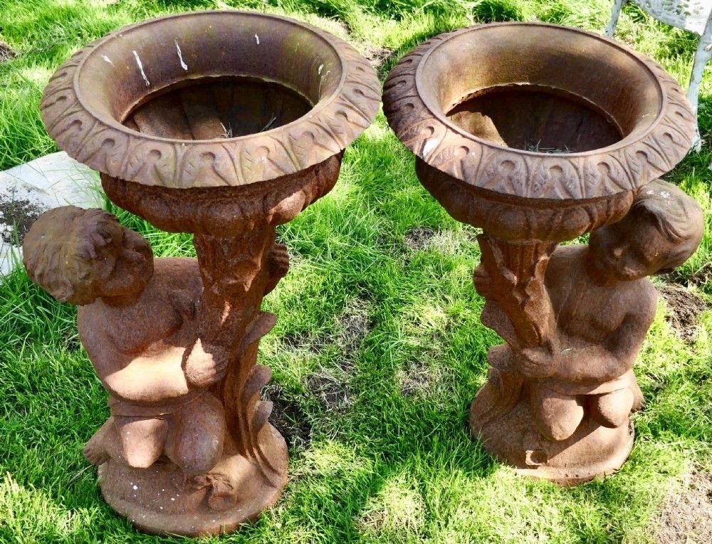 Pair Of Classical Iron Planters In The Form Of The Gemini Twins photo for sale