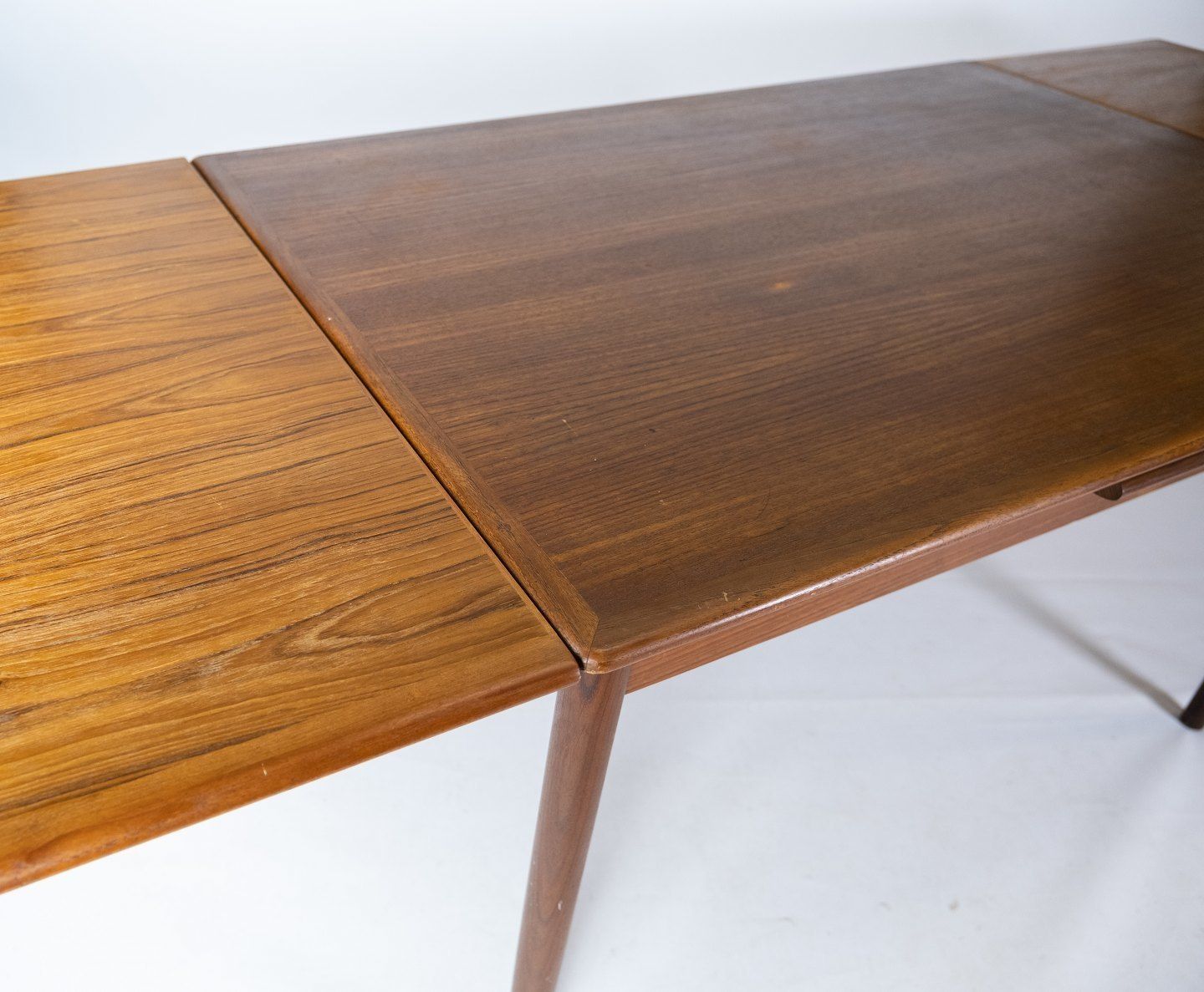 Teak Dining Table With Dutch Pull Out Of Danish Design From The 1960s. photo 805.0