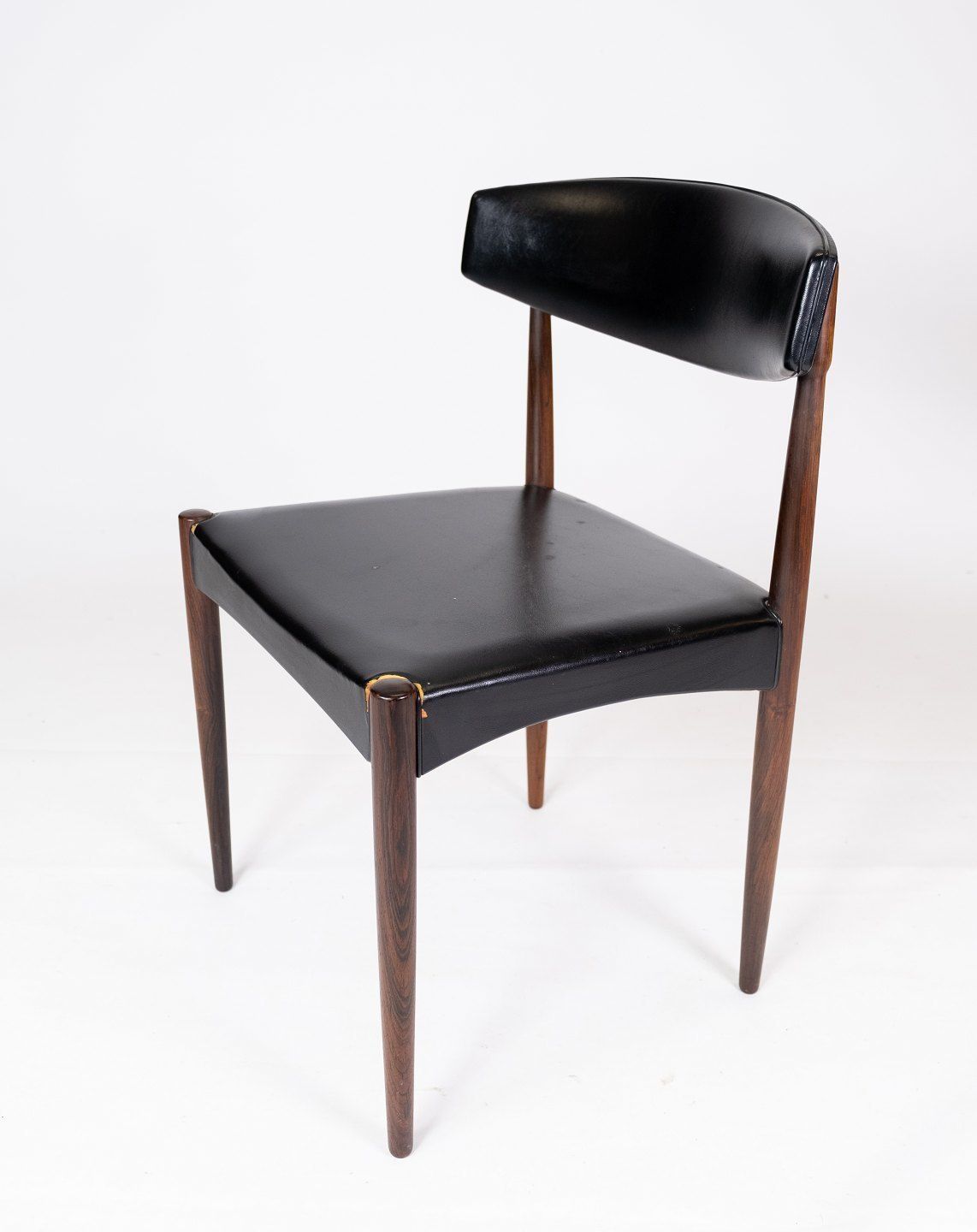 Set Of Four Dining Chairs In Rosewood And Black Leather Of Danish Design From The 1960s. photo furniture