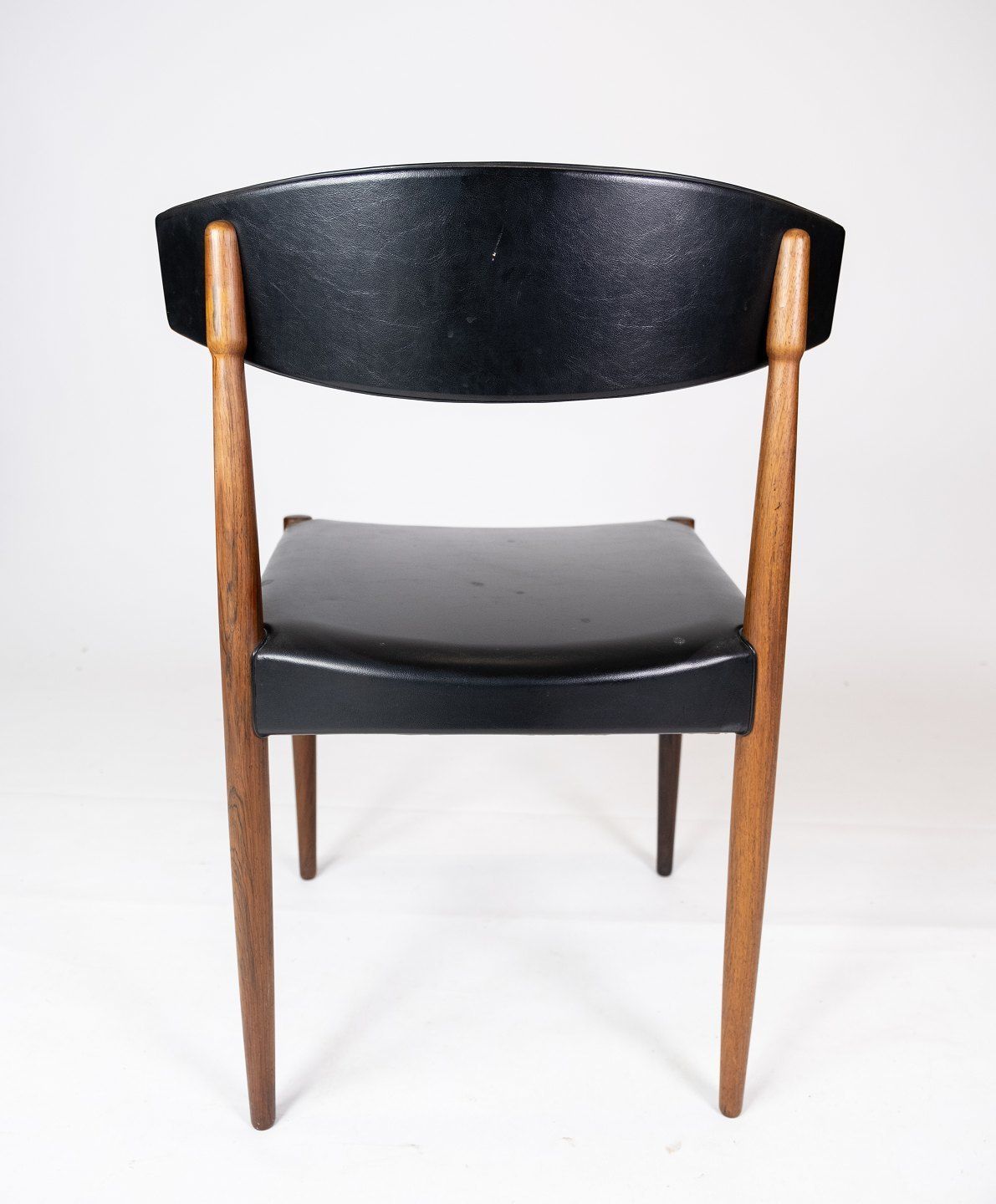 Set Of Four Dining Chairs In Rosewood And Black Leather Of Danish Design From The 1960s. photo vinterior