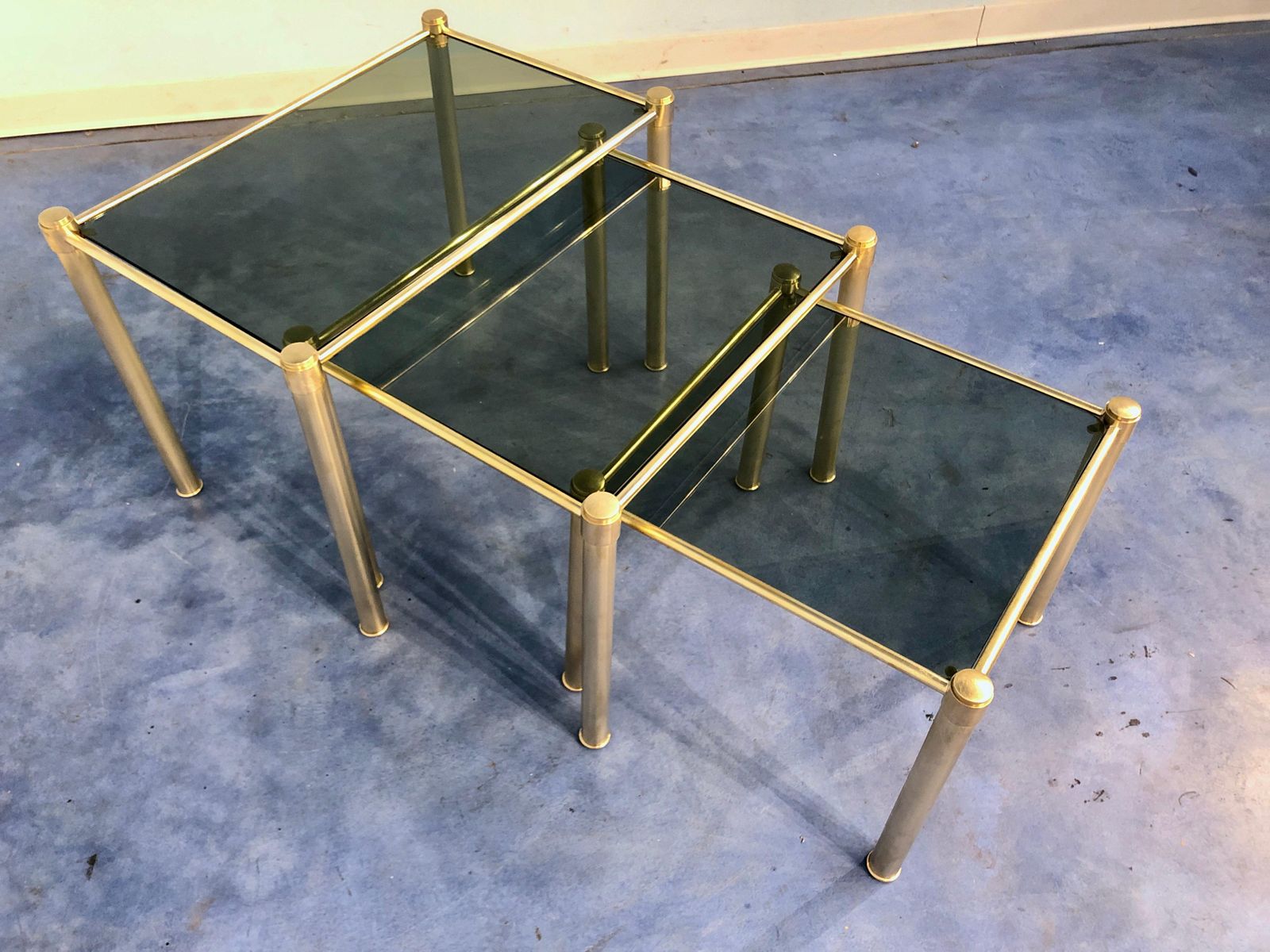 photo furniture Italian Mid Century Modern Brass And Smoked Glass Nesting Tables, 1970s