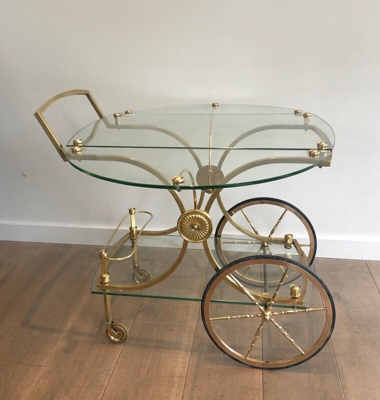 Maison Bagués. Rare Neoclassical Style Brass And Glass Drinks Trolley With Folding Rounded Glass Sides. French. Circa 1940 photo 2950.0