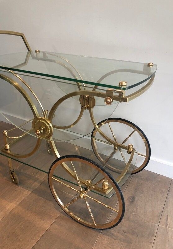 Maison Bagués. Rare Neoclassical Style Brass And Glass Drinks Trolley With Folding Rounded Glass Sides. French. Circa 1940 photo buy