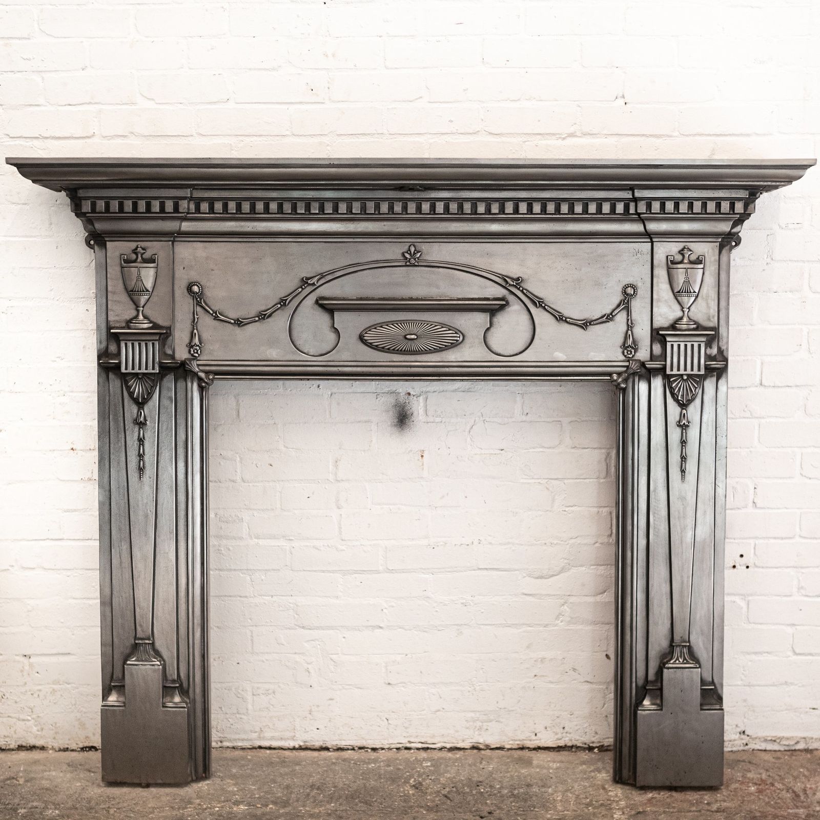 Antique Polished Cast Iron Fireplace Surround photo for sale