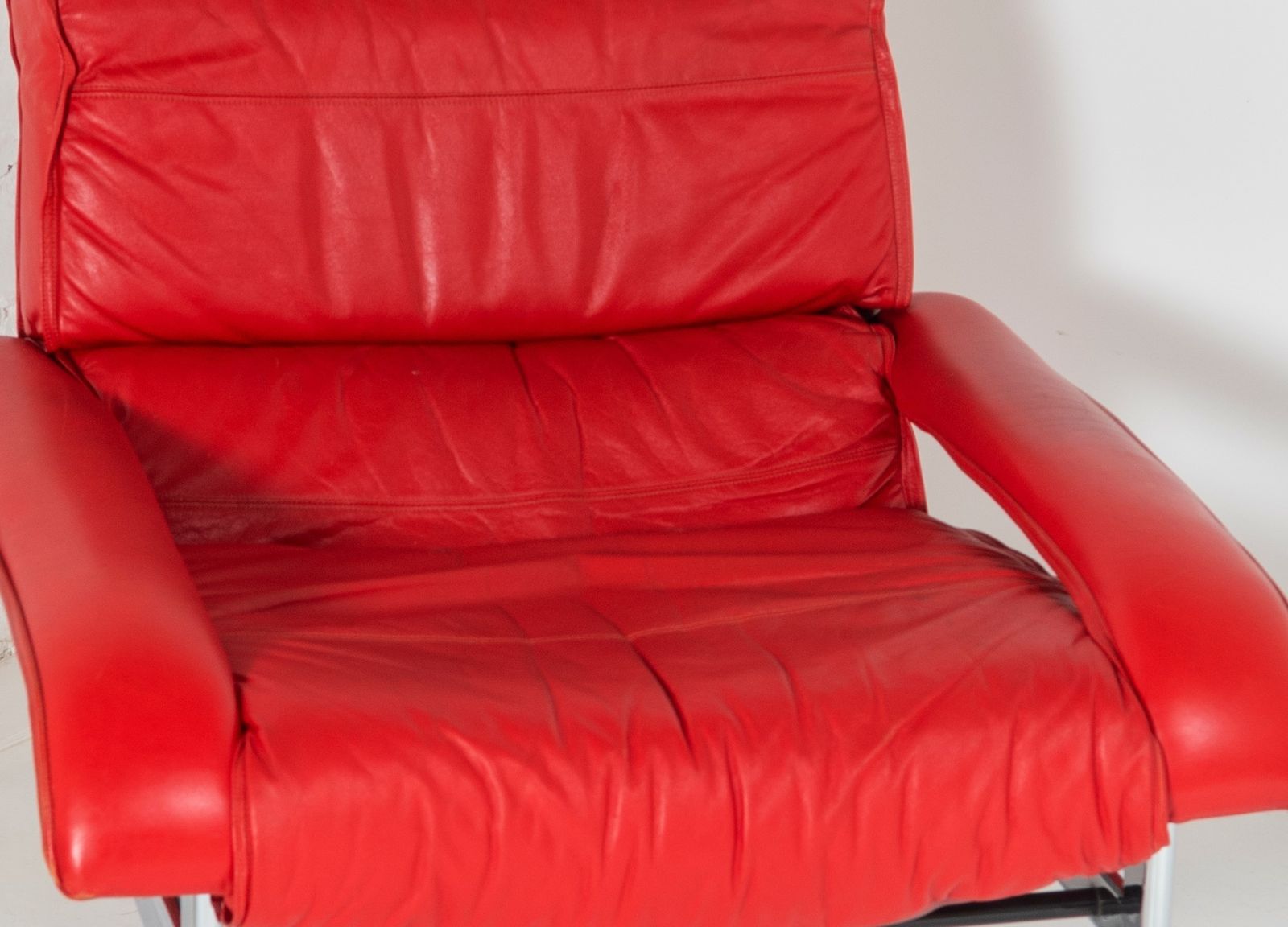 photo vinterior Mid Century Pieff Red Leather Tubular Chrome Swivel Chair With Footstool Ottoman
