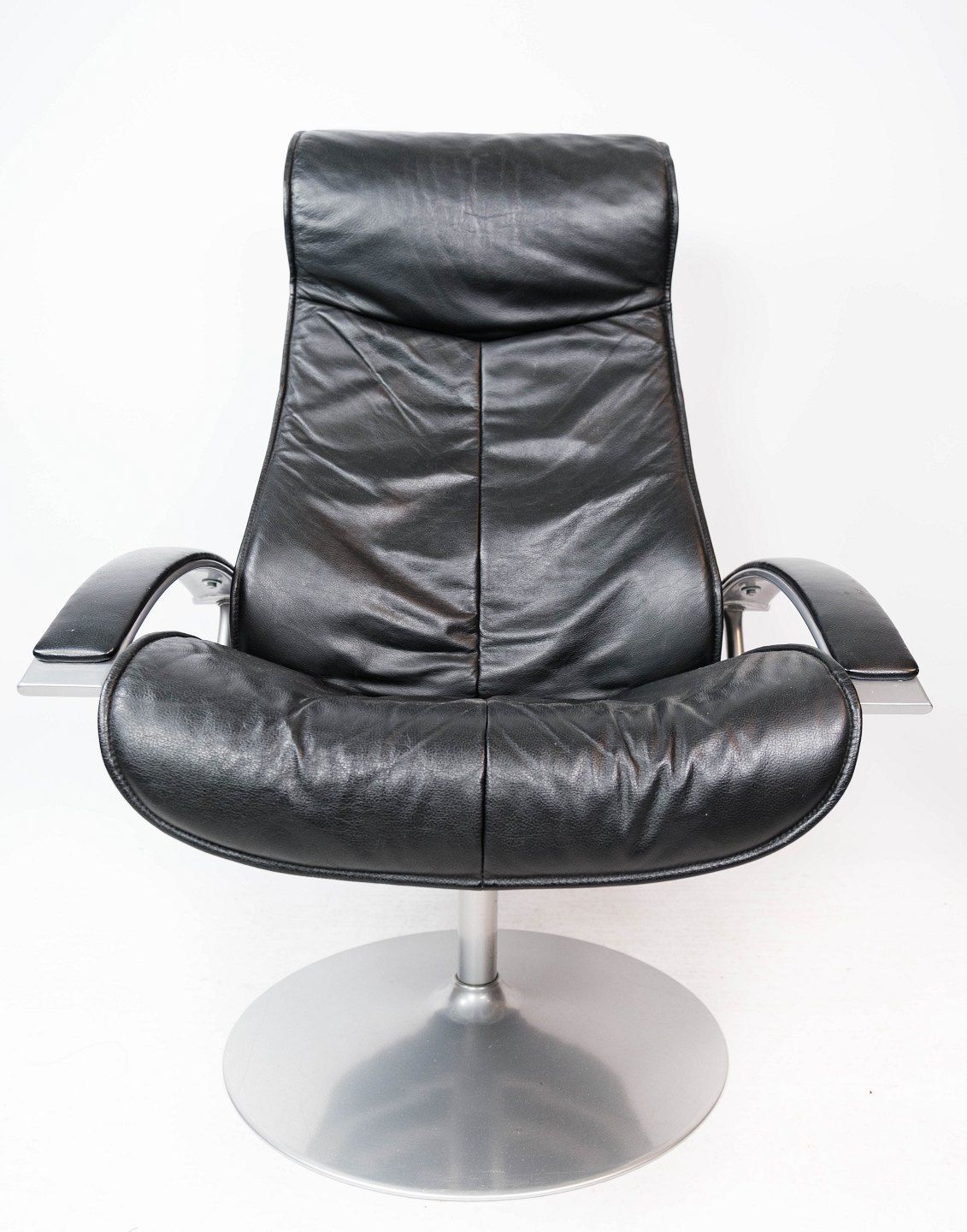 Armchair With Stool Upholstered In Black Leather And Metal Frame, By Danish Design From The 1970s. photo furniture