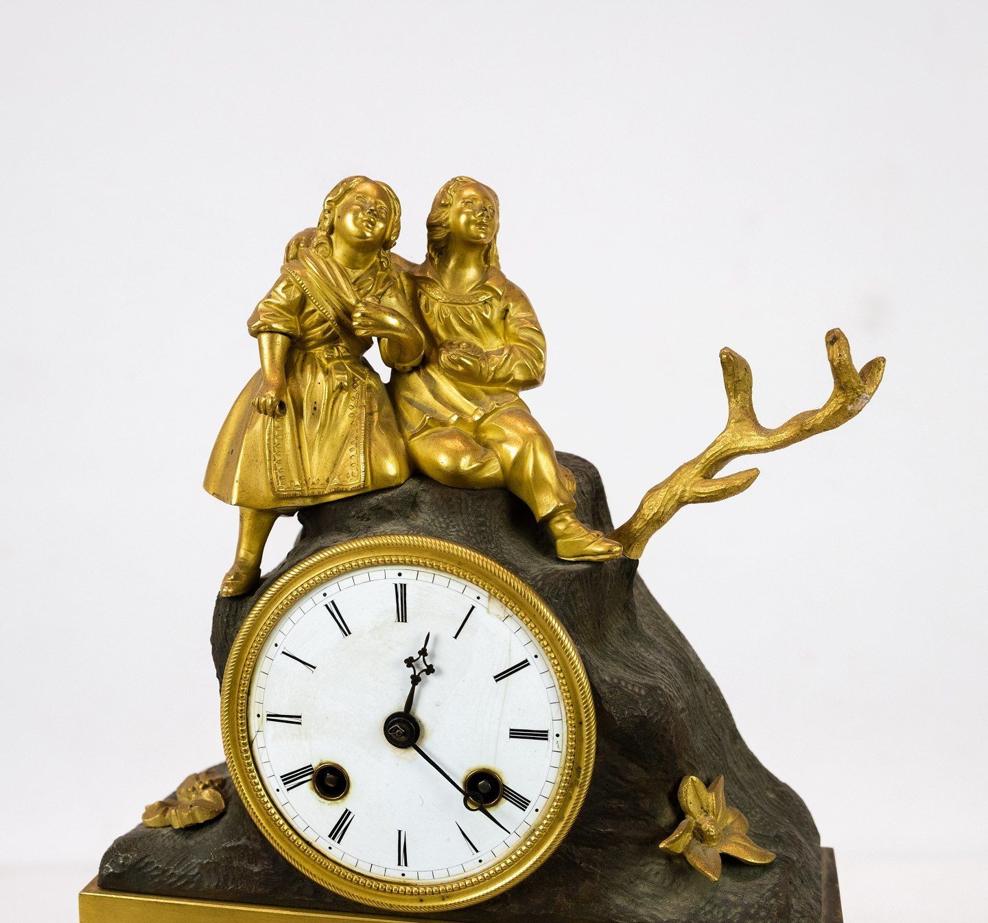 French Clock Of Gilded Bronze From The 1820s. photo for sale